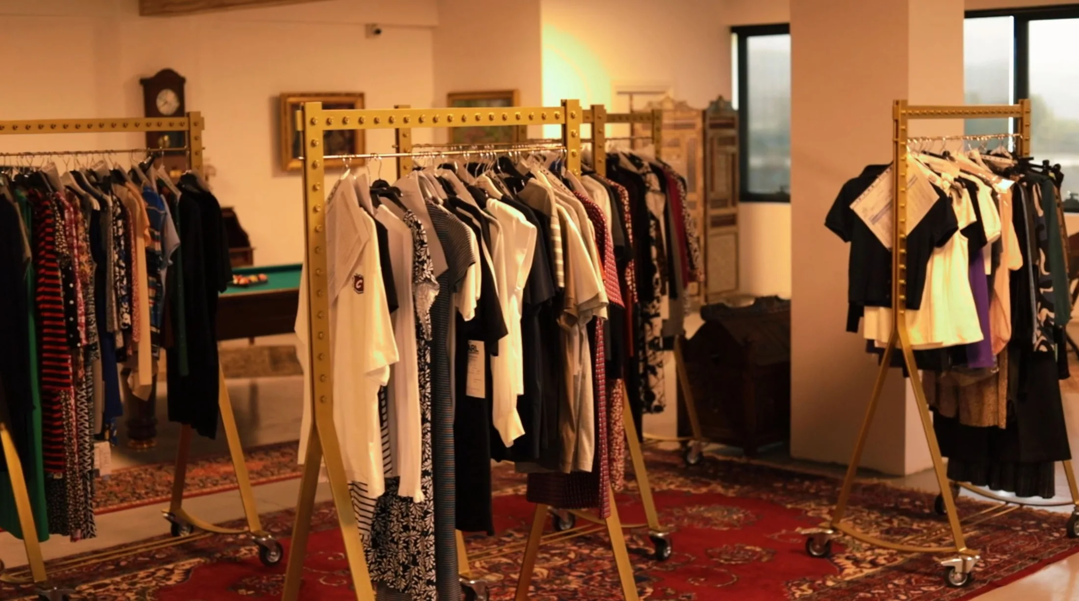 The Darsateks showroom with rails of sample garments
